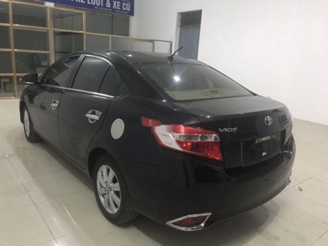 Bán Toyota Vios đời 2015, màu đen, giá tốt0