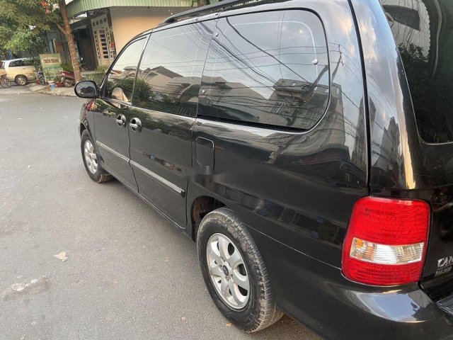 Bán Kia Carnival năm 2009, màu đen, xe nhập, giá tốt0