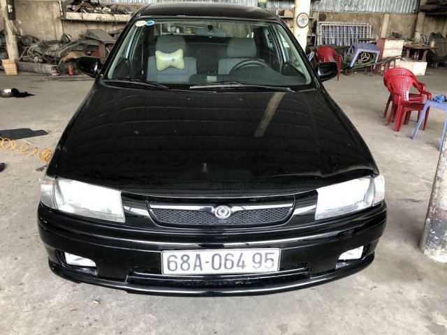 Cần bán Mazda 323 năm 1997, màu đen, nhập khẩu, giá tốt0