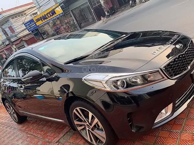 Bán Kia Cerato 1.6 AT sản xuất năm 2018, màu đen giá cạnh tranh0