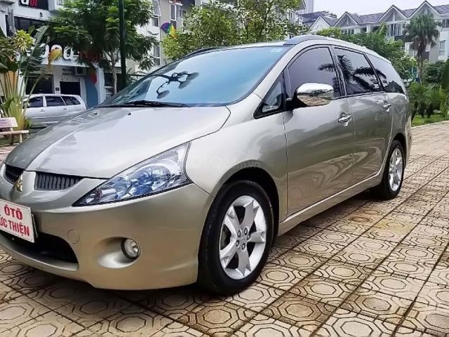 Cần bán Mitsubishi Grandis 2.4 AT năm sản xuất 2009, màu vàng0