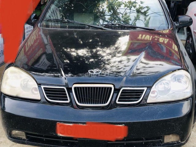 Cần bán lại xe cũ Daewoo Lacetti sản xuất 2004, màu đen0