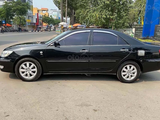 Bán xe Toyota Camry đời 2003, màu đen chính chủ