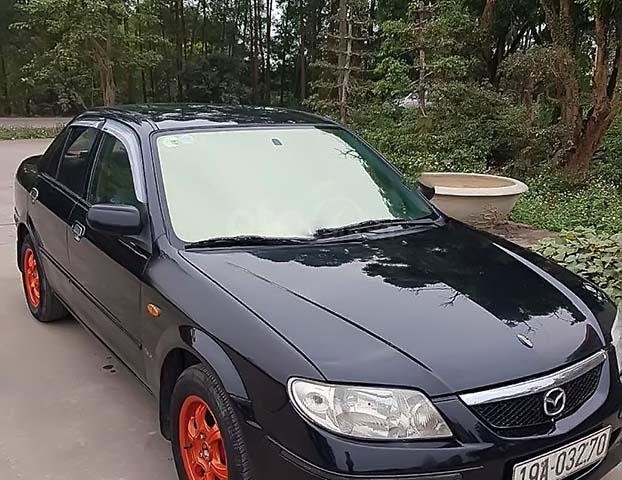 Bán xe Mazda 323 đời 2004, màu đen, nhập khẩu0