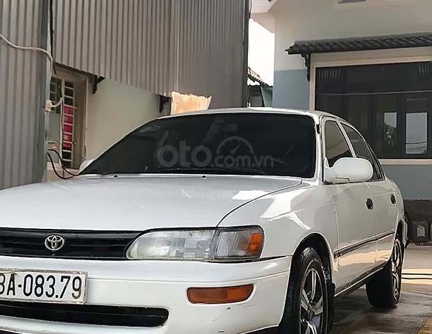 Cần bán xe Toyota Corolla đời 1995, màu trắng, nhập khẩu nguyên chiếc số tự động0