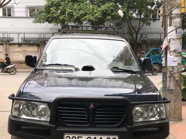 Cần bán gấp Mitsubishi Jolie đời 2003, màu đen0