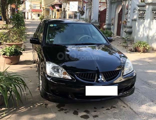 Bán Mitsubishi Lancer sản xuất năm 2005, màu đen, giá chỉ 180 triệu0