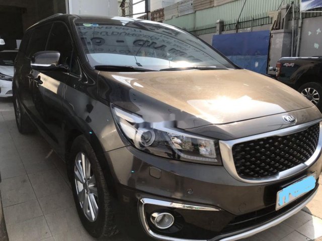 Bán Kia Sedona 3.3 G AT năm sản xuất 2015, màu nâu