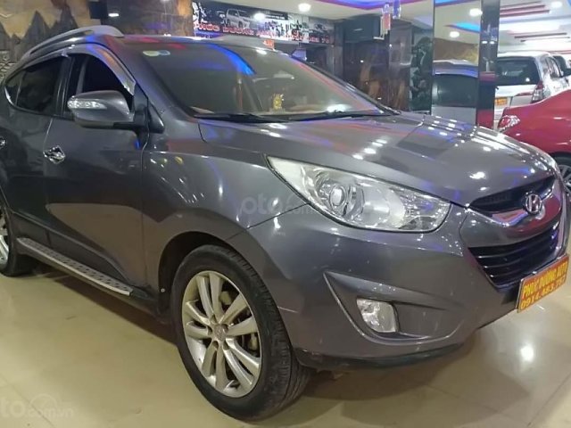 Cần bán xe Hyundai Tucson 2.0 AT 4WD năm 2012, màu xám, nhập khẩu nguyên chiếc chính chủ0