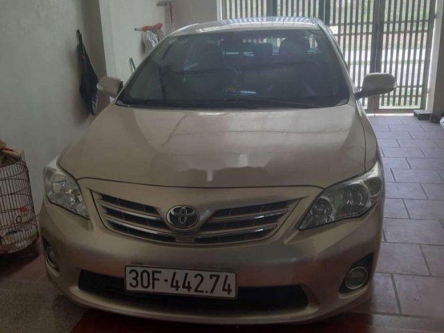 Cần bán Toyota Corolla Altis đời 2013, màu vàng, giá 555tr0