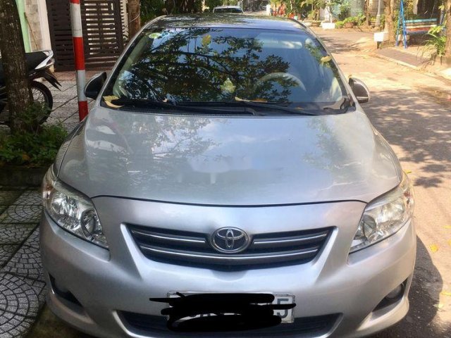 Cần bán xe Toyota Corolla Altis 2009, màu bạc chính chủ0