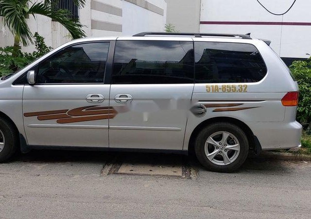 Cần bán lại xe Honda Odyssey năm sản xuất 2004, màu bạc còn mới, giá tốt0