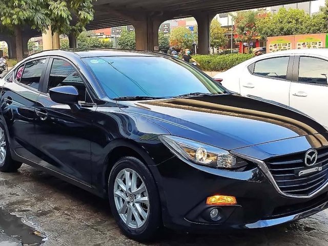 Cần bán Mazda 3 1.5 AT đời 2016, màu đen, giá chỉ 563 triệu0