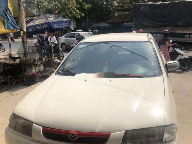 Bán xe Mazda 323 đời 2000, màu trắng, giá tốt0