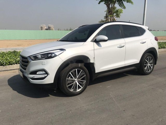 Bán xe Hyundai Tucson 2.0 AT đời 2015, màu trắng, xe nhập xe gia đình0