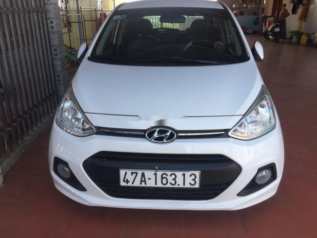 Cần bán gấp Hyundai Grand i10 đời 2016, màu trắng, nhập khẩu0