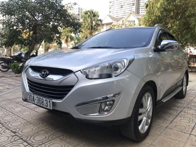 Bán ô tô Hyundai Tucson năm sản xuất 2011, màu bạc0