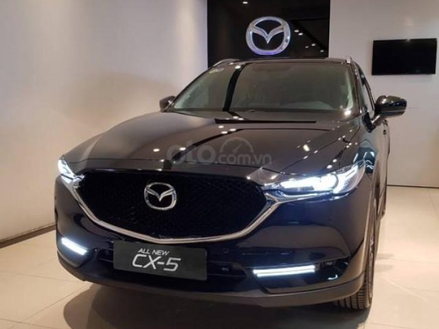 New CX5 2.0 Deluxe ưu đãi giá tốt, sẵn xe, hỗ trợ vay 90%0