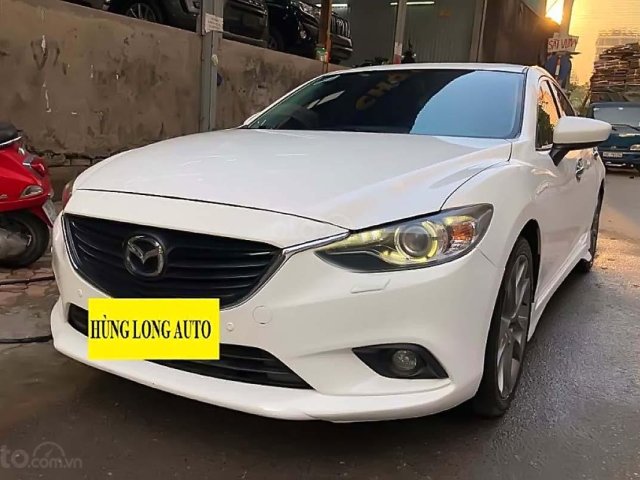 Cần bán xe Mazda 6 đời 2015, màu trắng số tự động, giá 615tr0