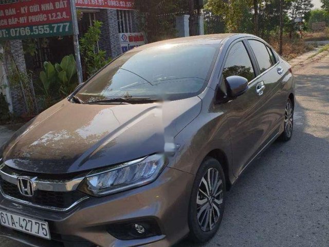 Cần bán lại xe Honda City TOP đời 2017, màu nâu