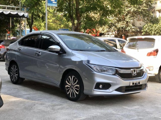 Bán ô tô Honda City TOP 1.5AT năm 2018, màu bạc, 566tr0