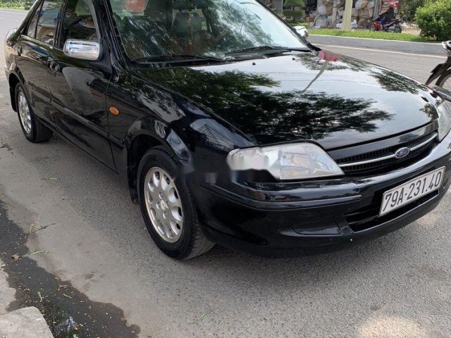 Cần bán gấp Ford Laser MT sản xuất năm 2001, 120tr0