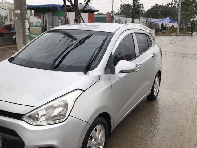 Bán Hyundai Grand i10 đời 2016, màu bạc, nhập khẩu chính chủ0