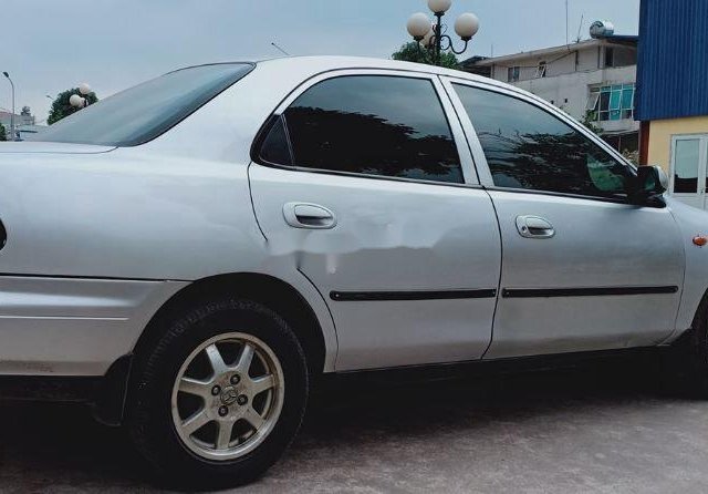 Bán Mazda 323 đời 1999, màu trắng