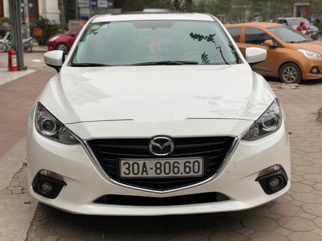 Cần bán gấp Mazda 3 1.5AT 2015, màu trắng0