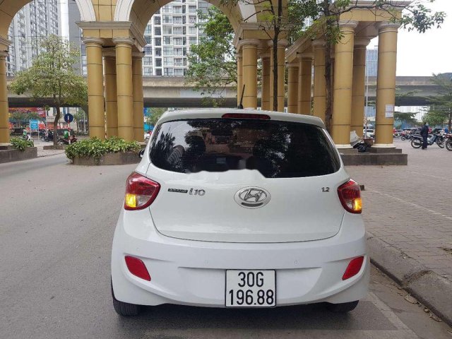 Bán Hyundai Grand i10 MT sản xuất năm 2016, màu trắng, xe nhập0