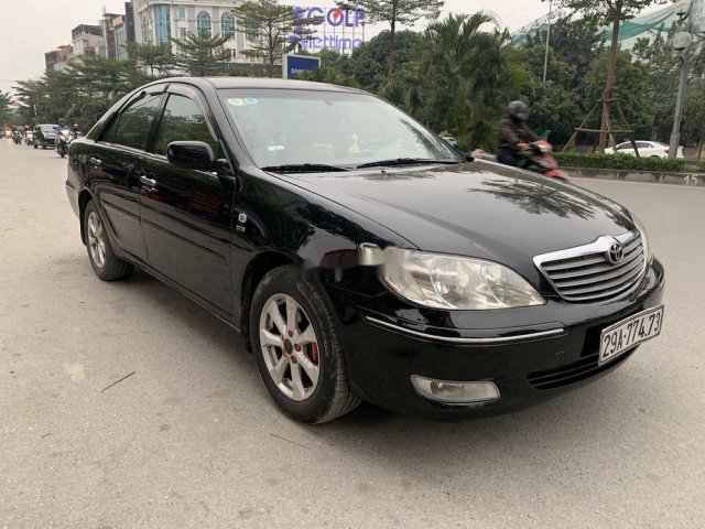 Bán Toyota Camry MT đời 2002, màu đen