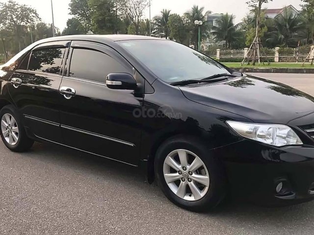 Bán Toyota Corolla Altis 2014, màu đen số sàn, 475tr