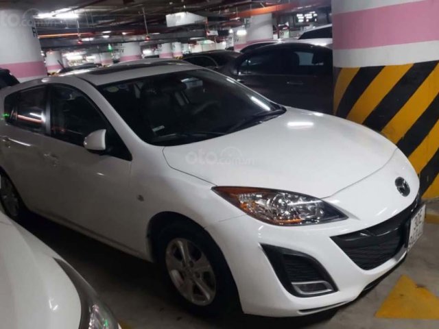 Cần bán Mazda 3 1.6AT năm 2010, màu trắng, xe nhập chính chủ0