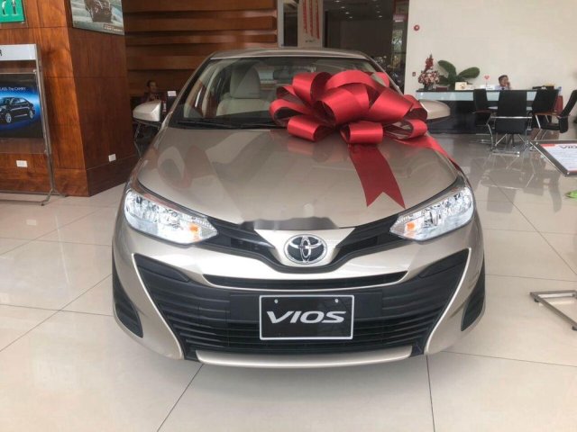 Bán ô tô Toyota Vios E MT sản xuất 2019, màu ghi vàng 0