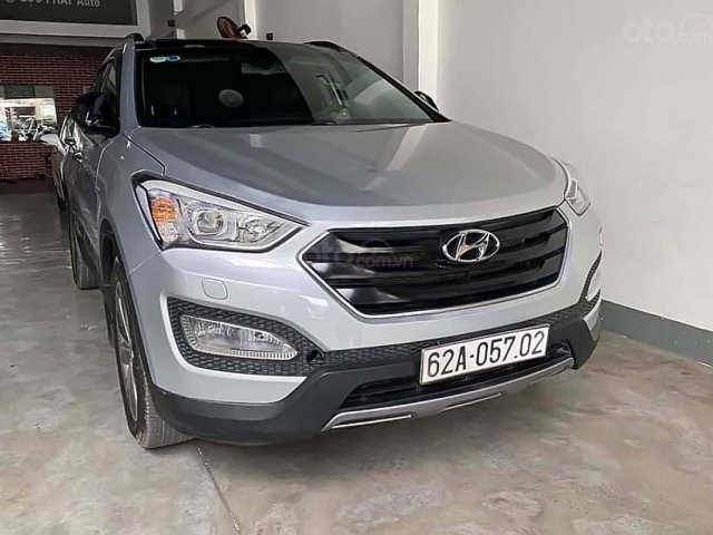 Bán ô tô Hyundai Santa Fe 2.4L 4WD đời 2015, màu bạc0