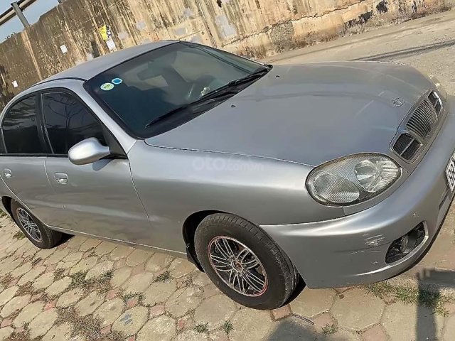 Cần bán gấp Daewoo Lanos SX đời 2002, màu bạc0