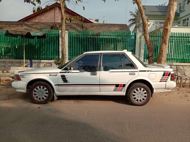 Bán Nissan Bluebird năm 1998, màu trắng, xe nhập, máy chất0