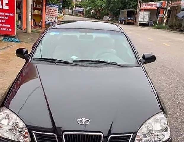 Cần bán Daewoo Lacetti EX 1.6 MT đời 2006, màu đen0