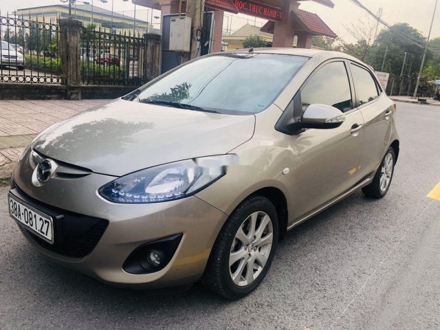 Bán xe Mazda 2 đời 2014, màu vàng0