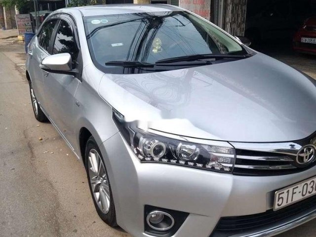 Cần bán xe Toyota Corolla Altis G AT đời 2014, màu bạc