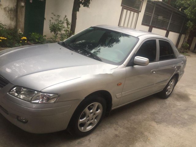 Bán Mazda 626 năm 2003, màu bạc, xe nhập, số sàn0