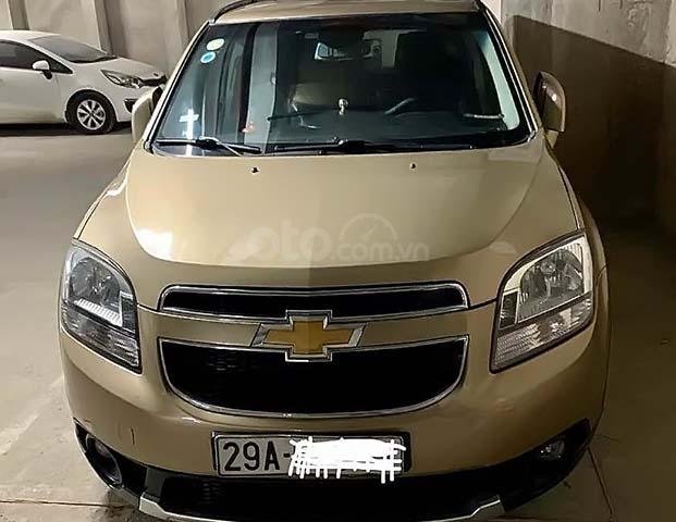 Cần bán lại xe Chevrolet Orlando sản xuất năm 2013, màu vàng số tự động0