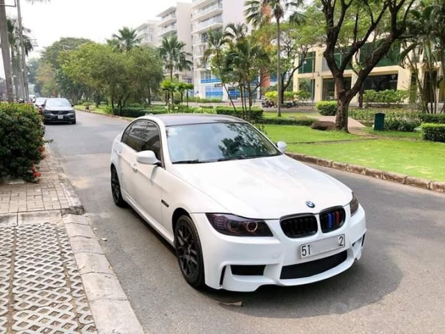 BMW 3 Series năm 2009, màu trắng, nhập khẩu nguyên chiếc, có cruise control, odo 90000km0