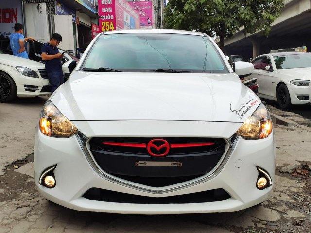 Bán xe Mazda 2 sản xuất 2016, màu trắng số tự động0