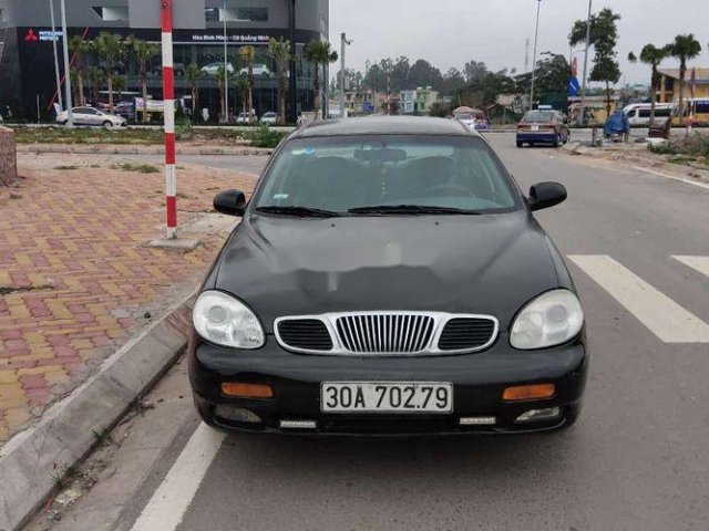 Cần bán xe Daewoo Leganza sản xuất 1997, màu đen giá cạnh tranh0