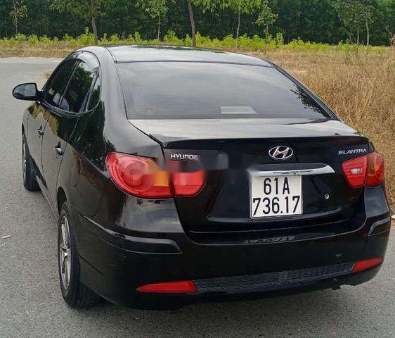 Bán ô tô Hyundai Elantra năm sản xuất 2011, màu đen giá cạnh tranh0