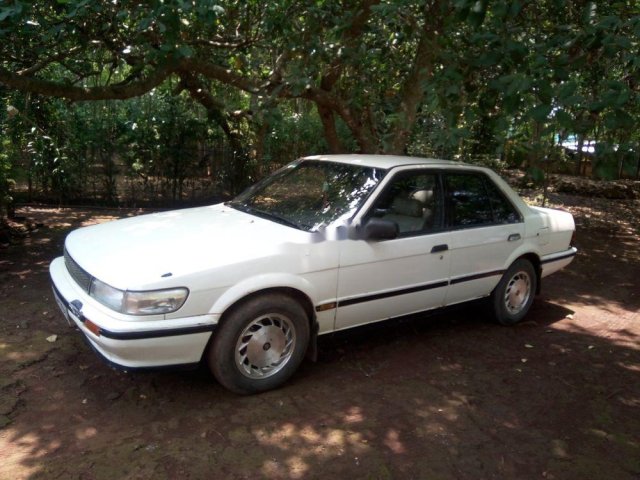 Bán xe Nissan Bluebird sản xuất năm 1990, màu trắng, nhập khẩu, 30 triệu0