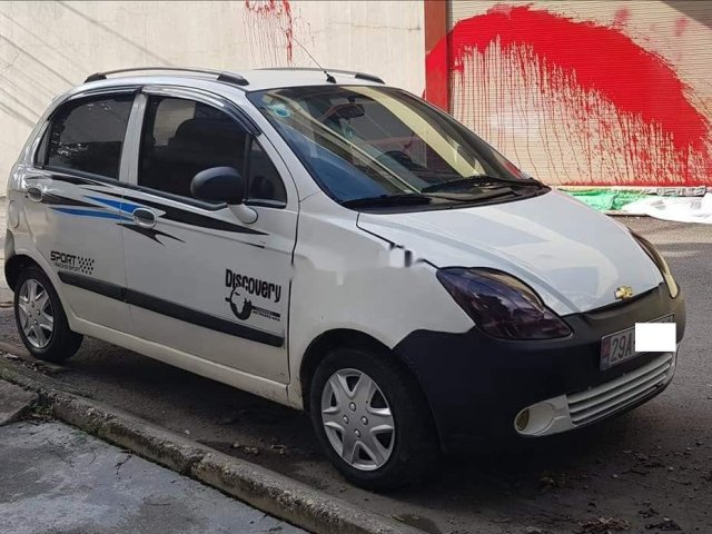 Bán ô tô Chevrolet Spark LT đời 2010, màu trắng số sàn giá cạnh tranh0