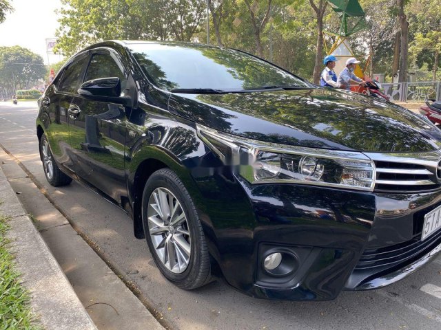 Cần bán xe Toyota Corolla Altis sản xuất 2014, màu đen, giá tốt0