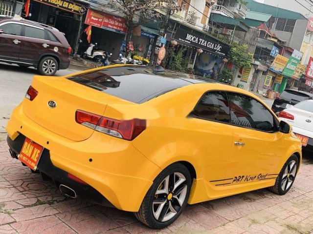 Cần bán gấp Kia Cerato Koup đời 2010, màu vàng, xe nhập